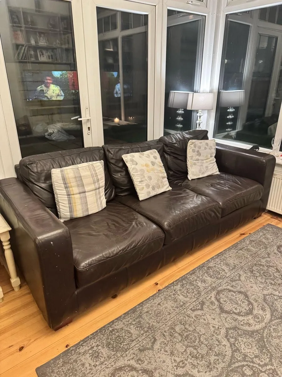 Two matching brown leather couches - Image 1