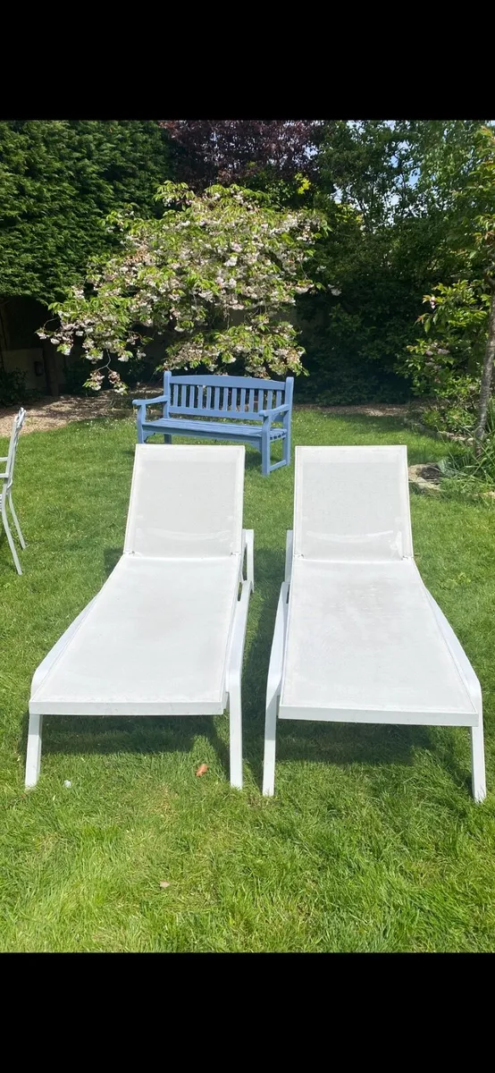 Two White Folding Sun Loungers with Covers - Image 1