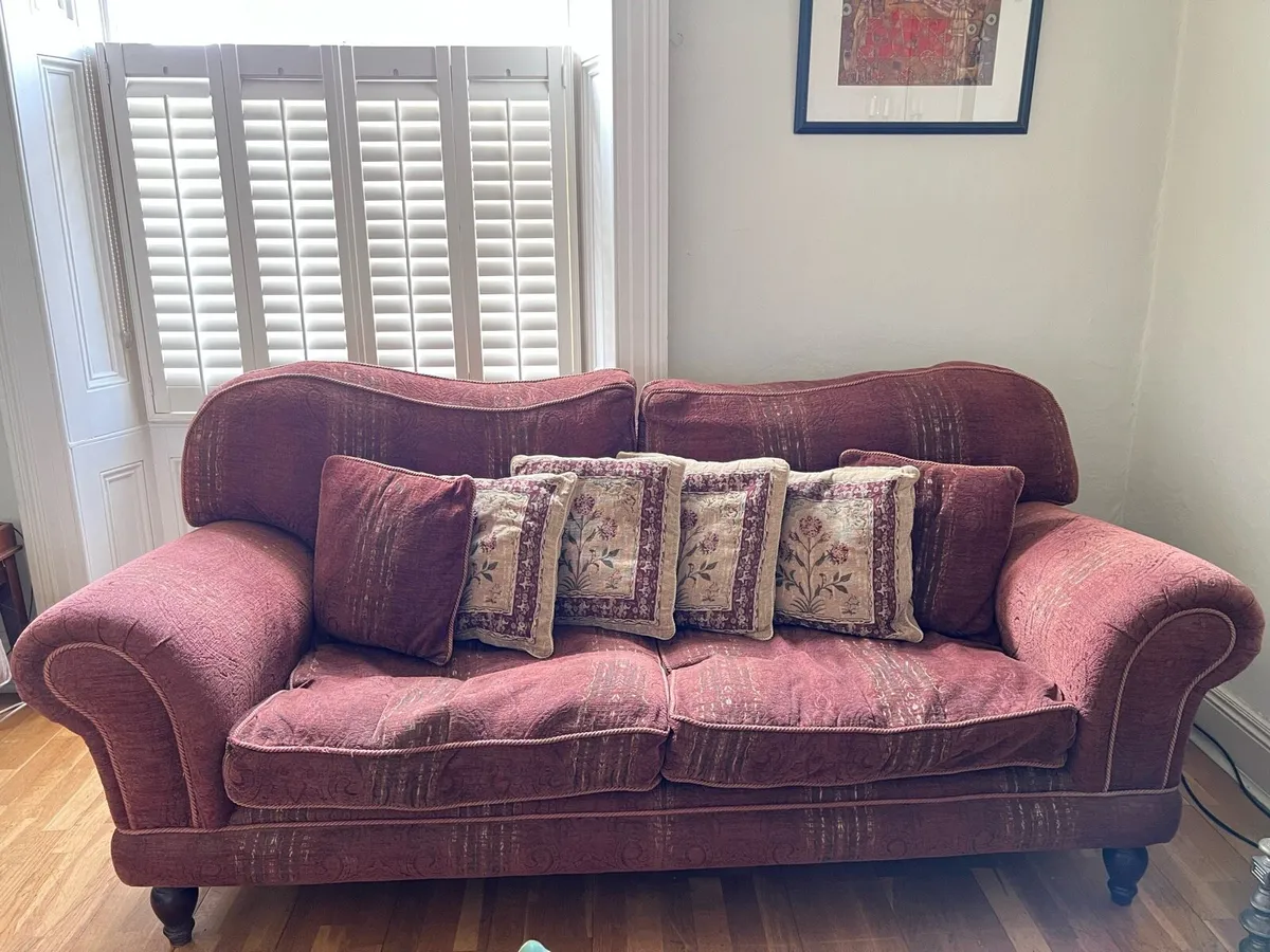 Burgundy couch with cushions - Image 1
