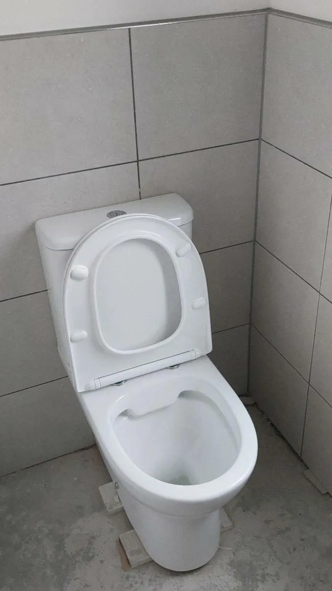 New toilet with soft-close seat