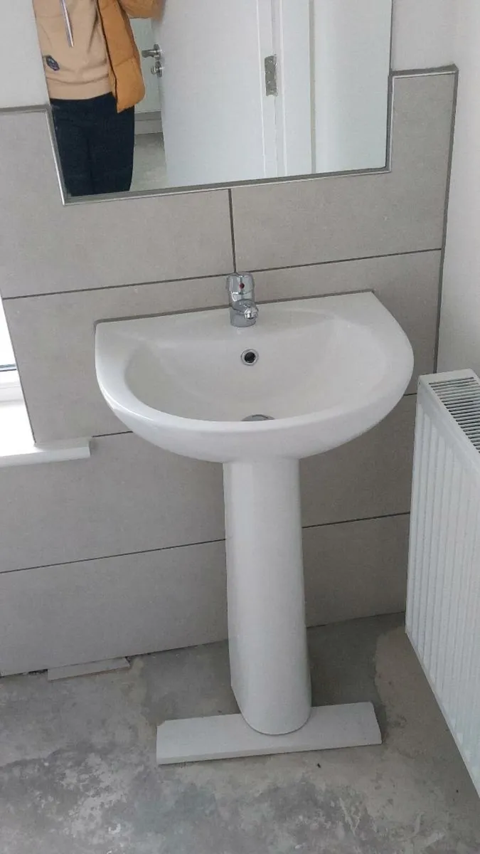 Freestanding sink with faucet