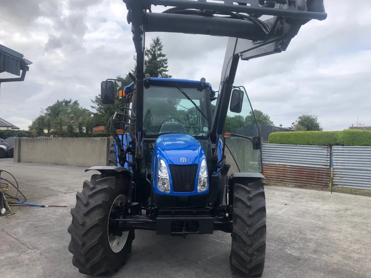 2007 New Holland  TL 100A with Quicke Loader - Image 1