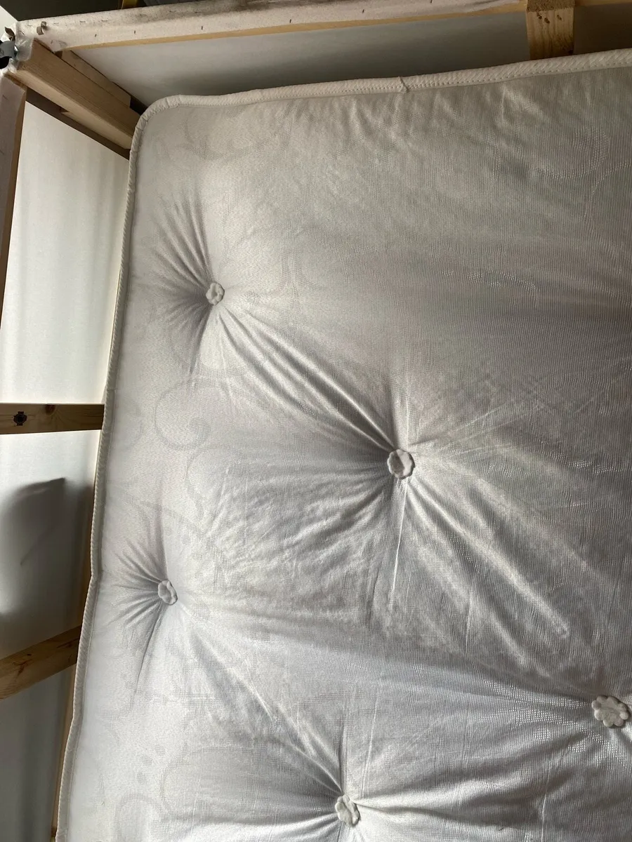 Bed with sleep over mattress - Image 1