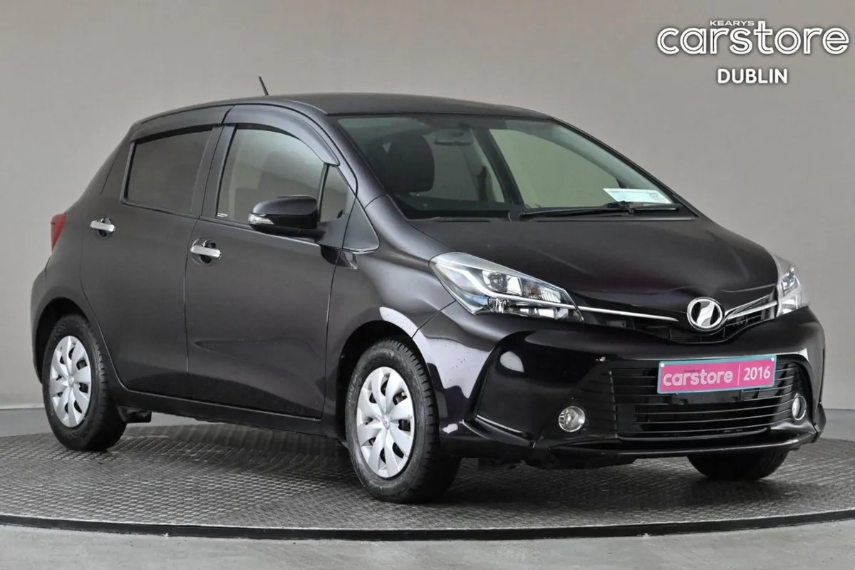 Toyota Vitz 1.3 CVT  reverse Cam privacy Glass - Image 1