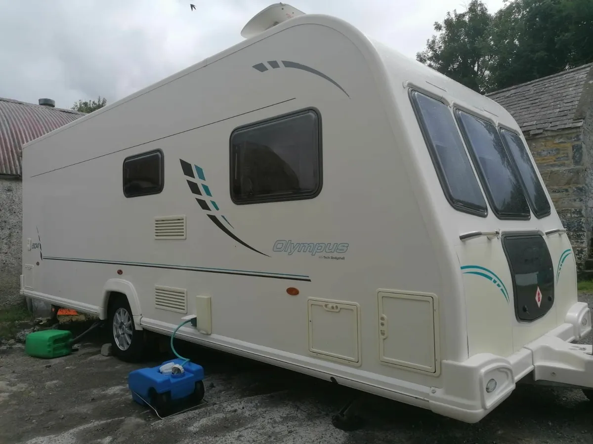 2011 Bailey Olmypus fixed bed 4/5 birth caravan in - Image 1
