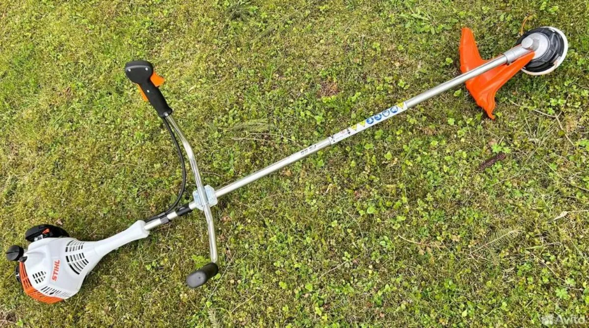 Stihl FS 55 lawn mower with trimmer head - Image 1
