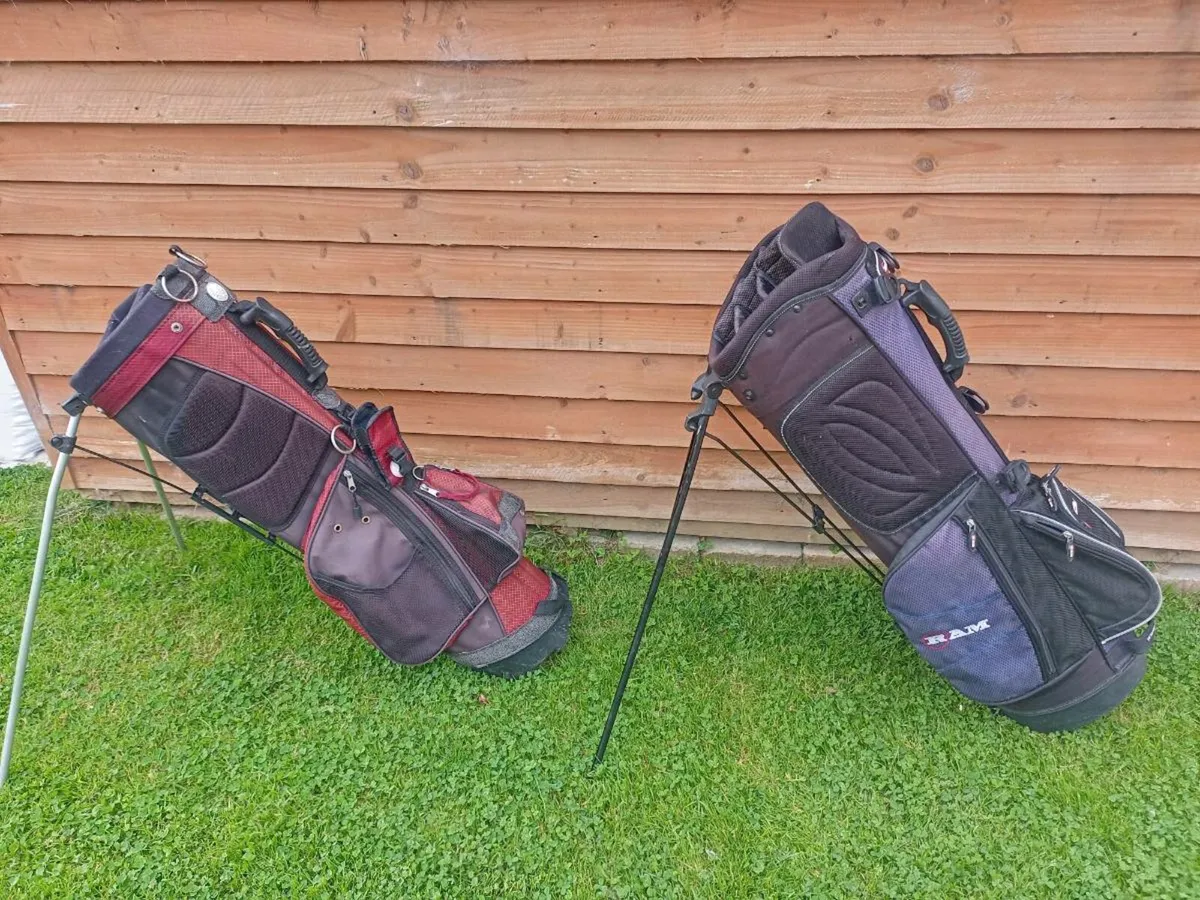 Two golf bags with stands. - Image 1