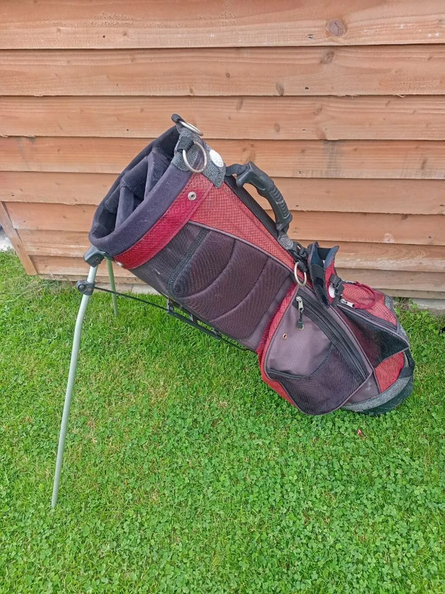 Two golf bags with stands. - Image 2
