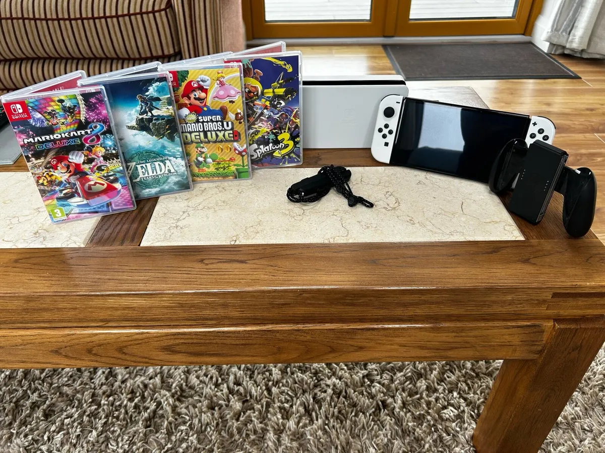 Nintendo Switch - OLED (4 Games Included) - Image 1