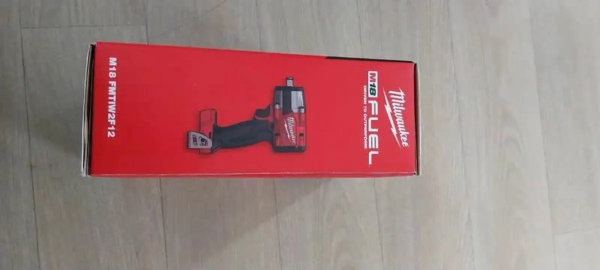 Milwaukee M18 FMTIW2F12 Impact Wrench + Sockets - Image 1