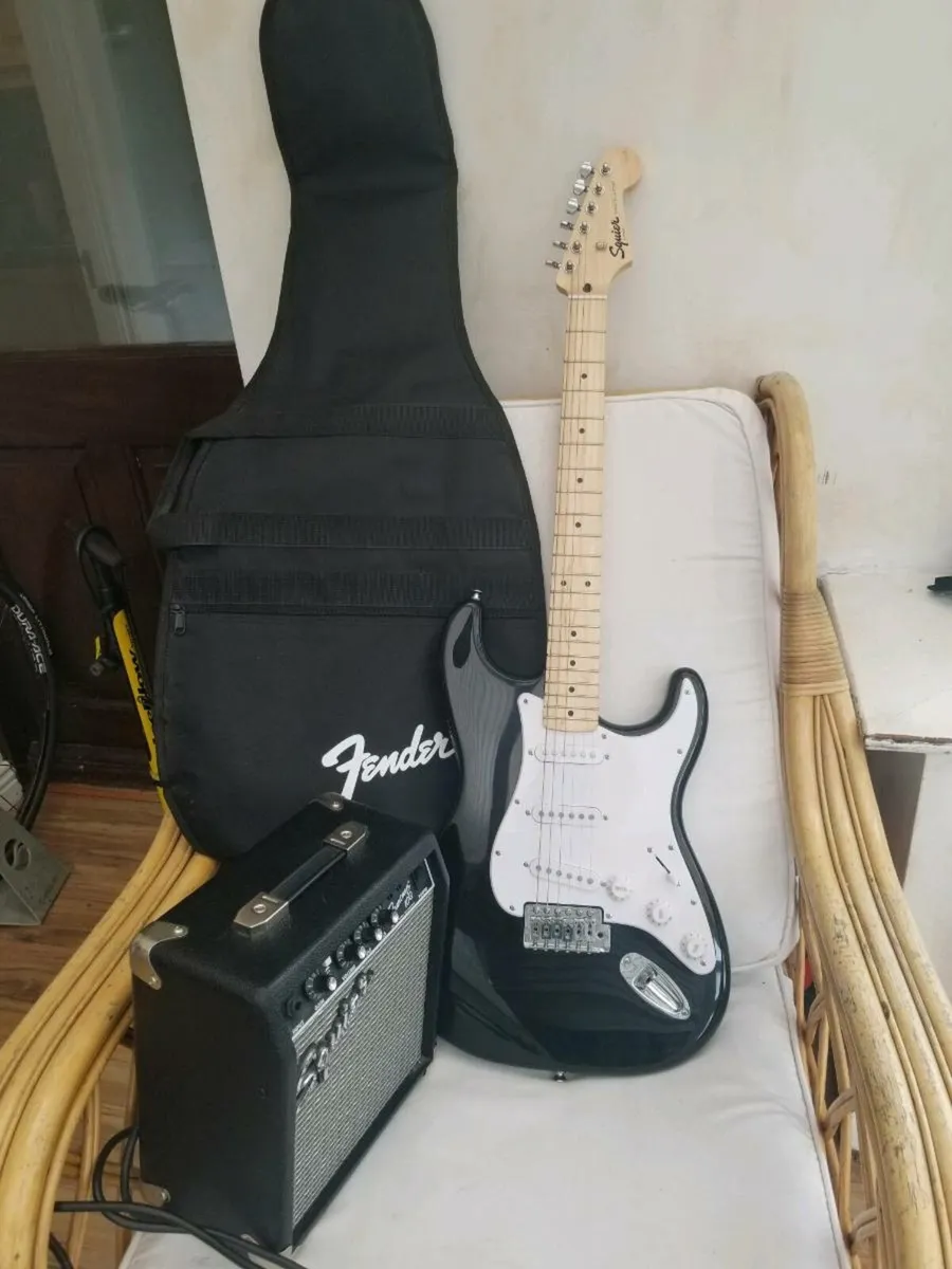 fender stratocaster electric guitar an fender amp - Image 1