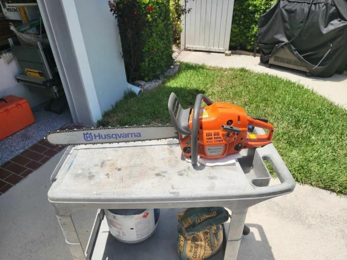 Husqvarna 24" Gas Chainsaw with Case and Accessori - Image 1
