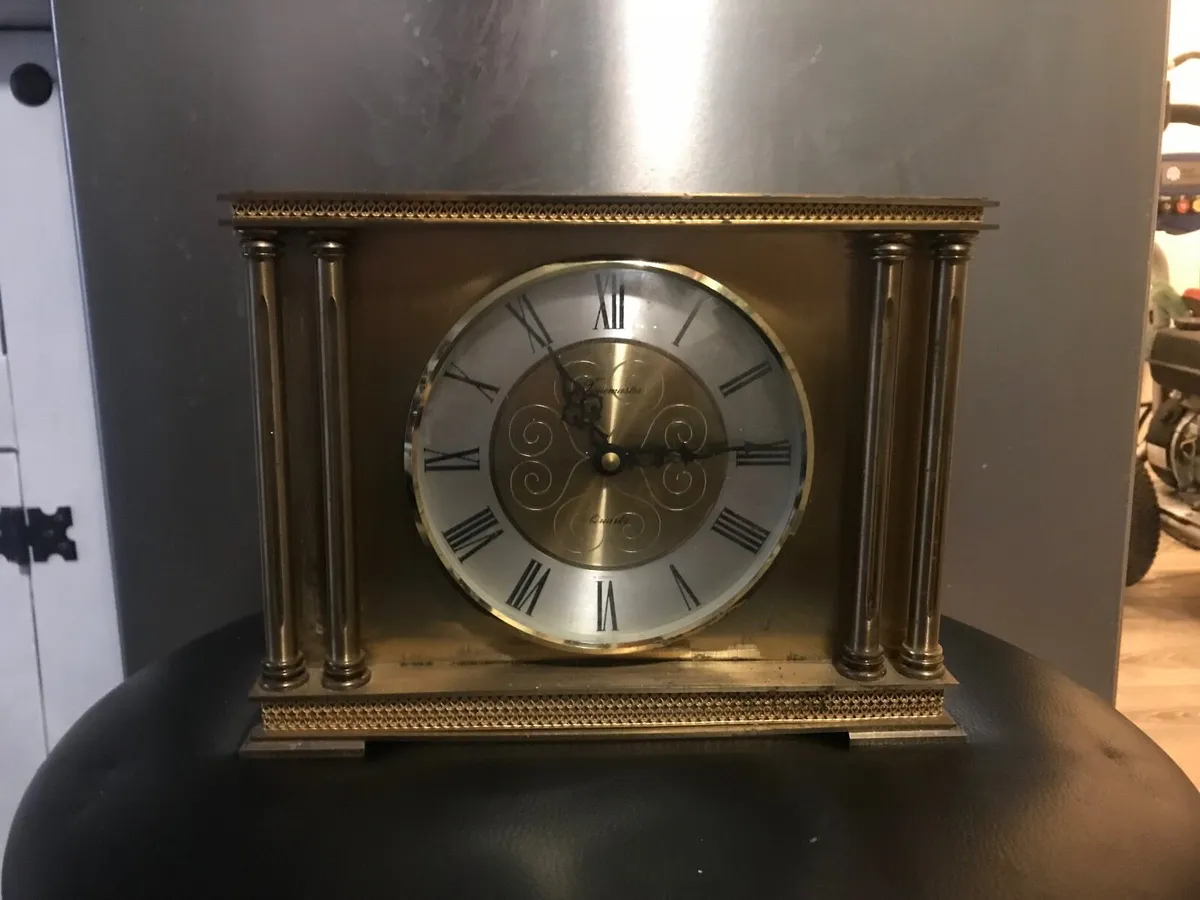 Antique brass clock