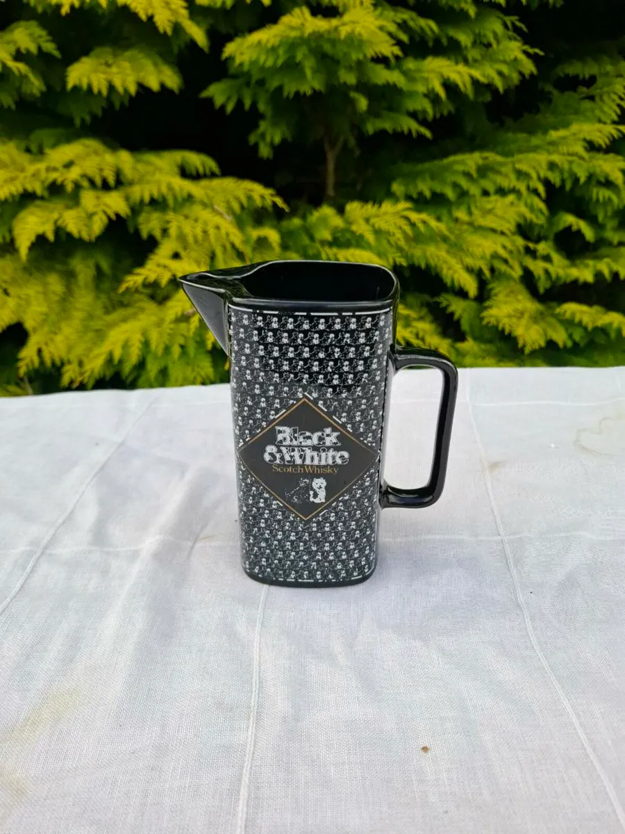Black and white whiskey pitcher postage possible