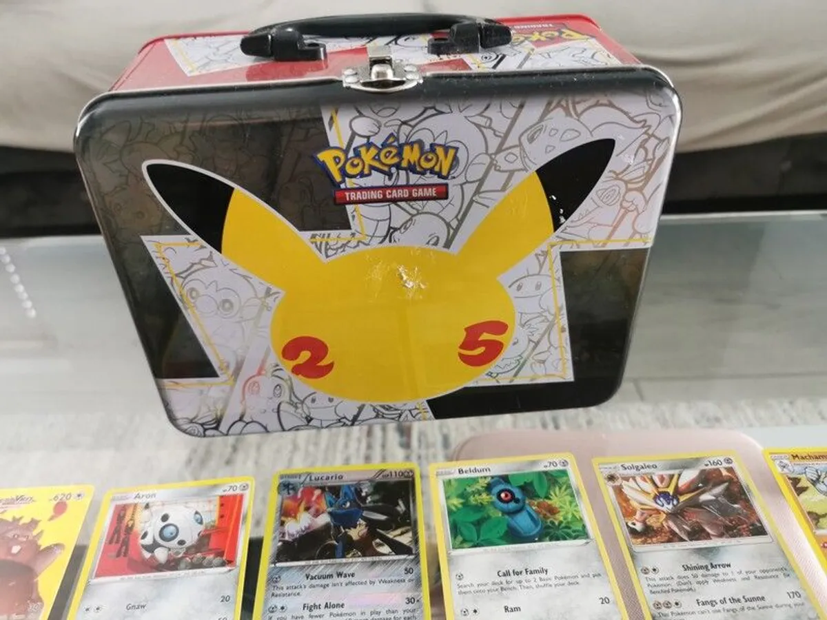 Pokemon cards and tin - Image 1