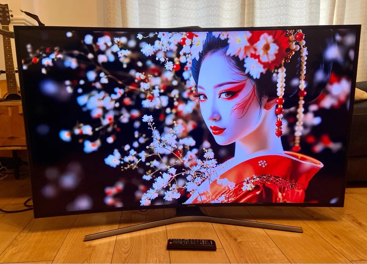 Samsung 55” 4K curved Smart TV - Image 1