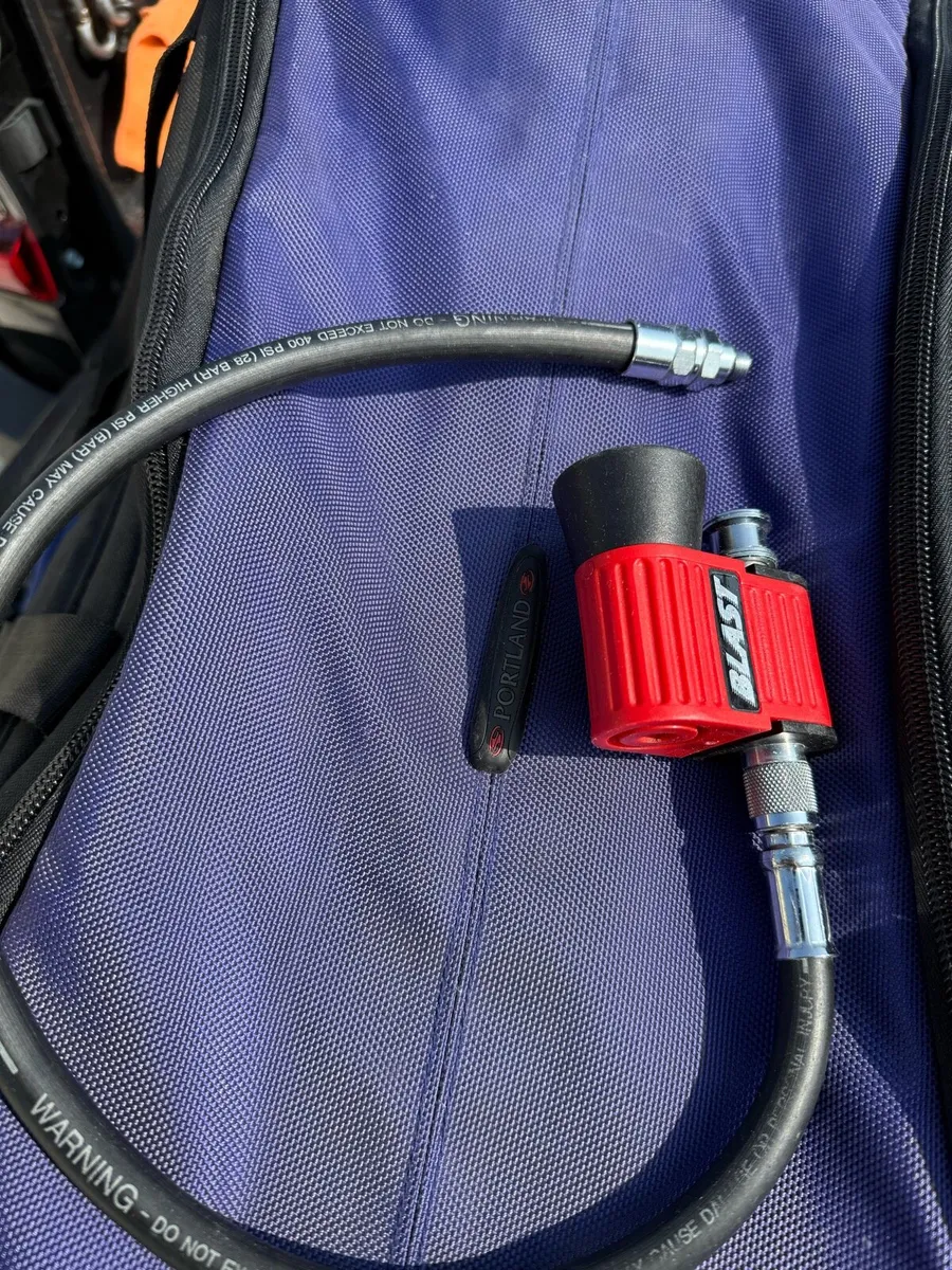 Scuba air blast horn with whip line