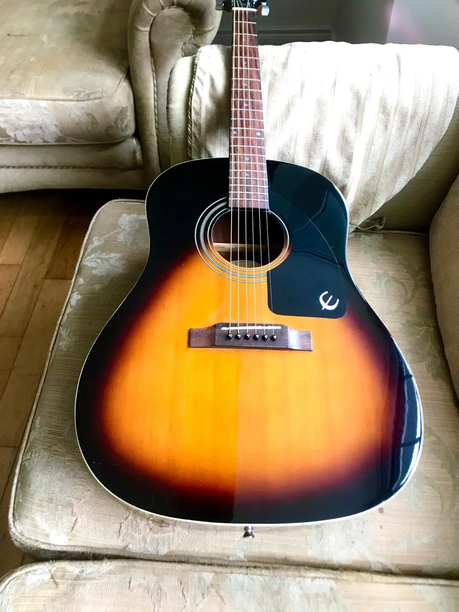 Epiphone Aj 100 vs Acoustic guitar - Image 1