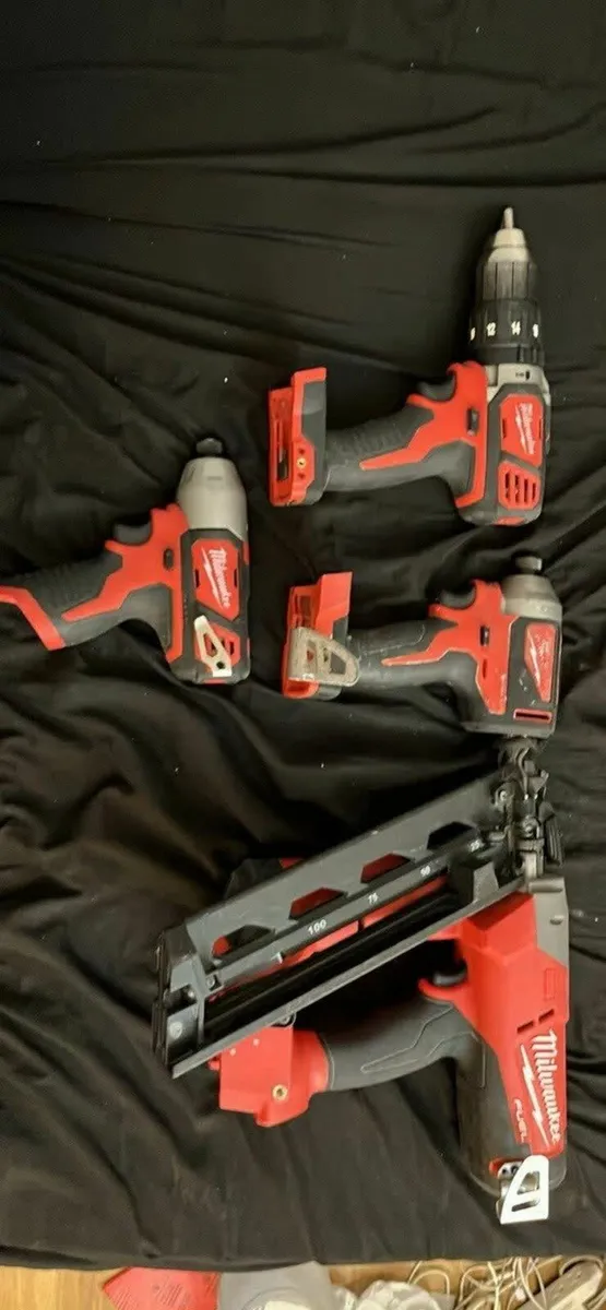 Milwaukee 4 Tools ( Nailer, Drill, Impacts) - Image 1