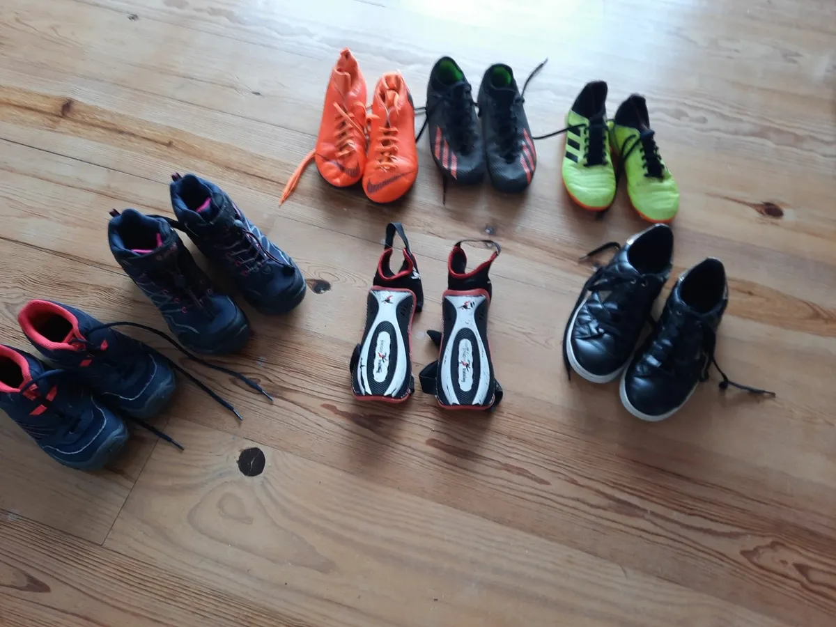 Lots of kids football boots and footwear - Image 1