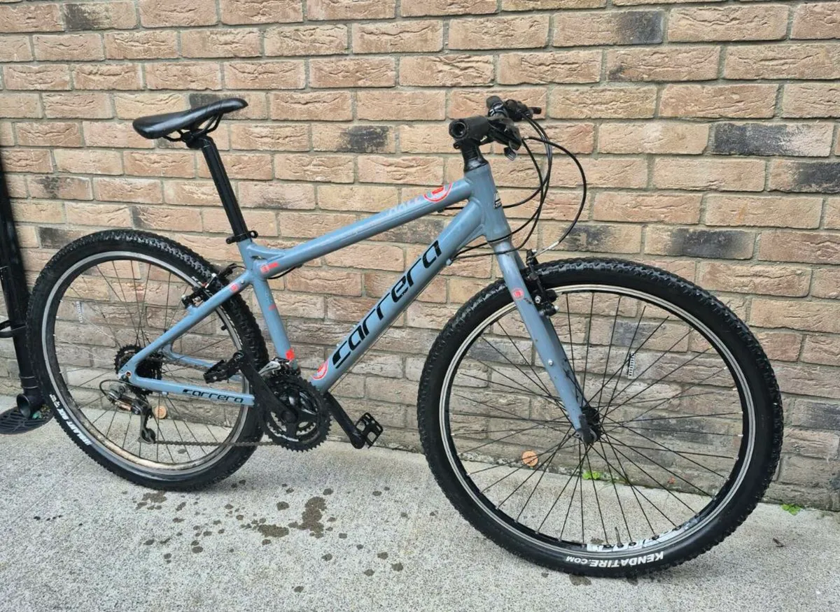 Adults Carrera axle ltd mountain bike very good - Image 1