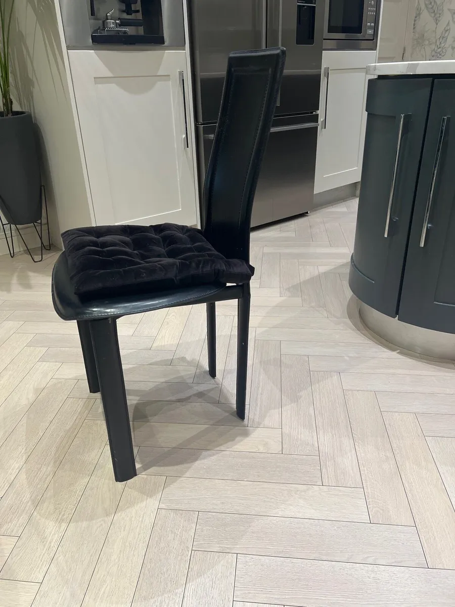 Eight black Corbusier designer dining chairs. - Image 1