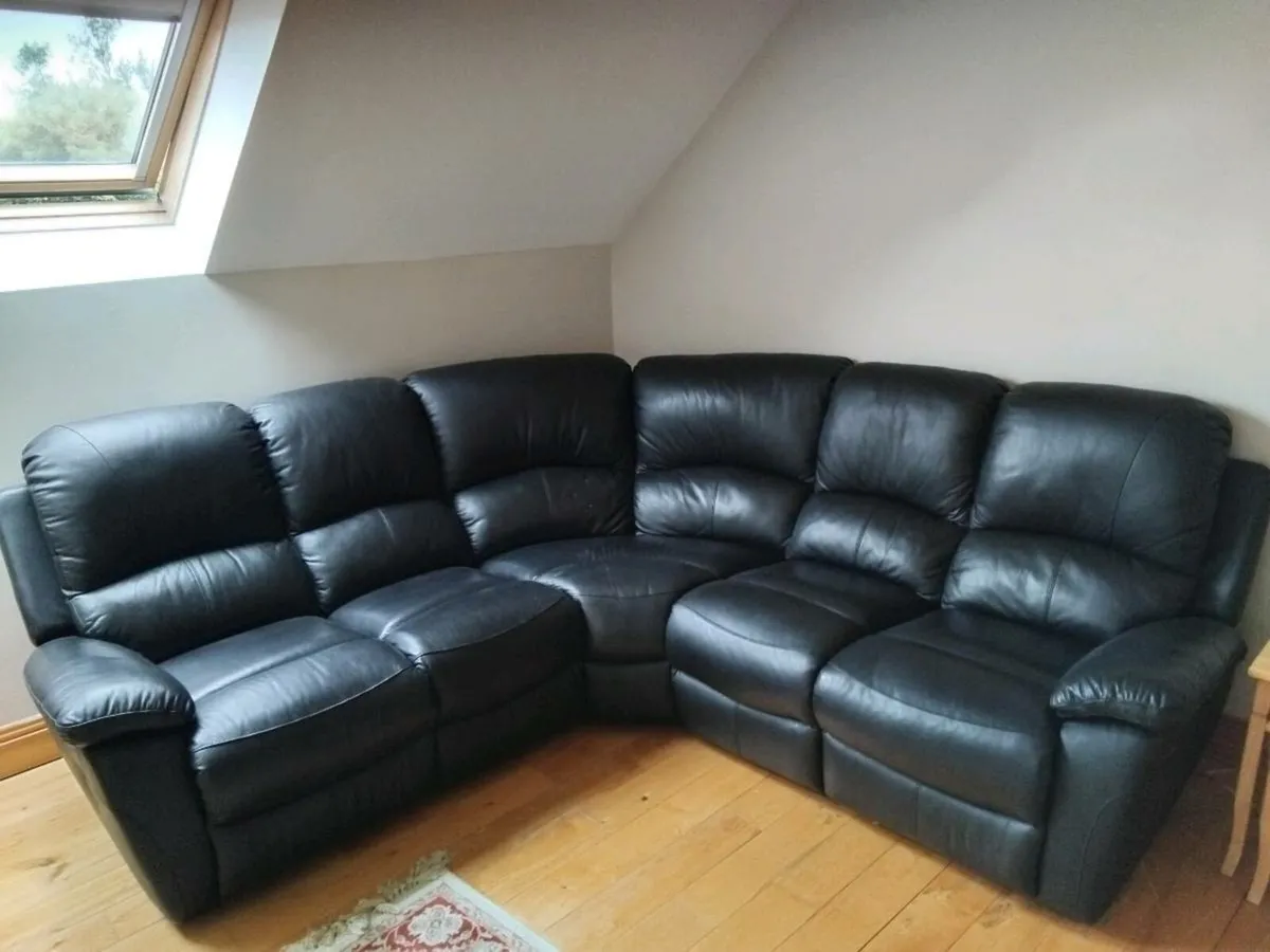 Black leather corner sofa