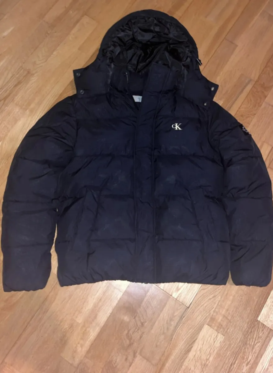 Black Calvin Klien puffer jacket - Image 1