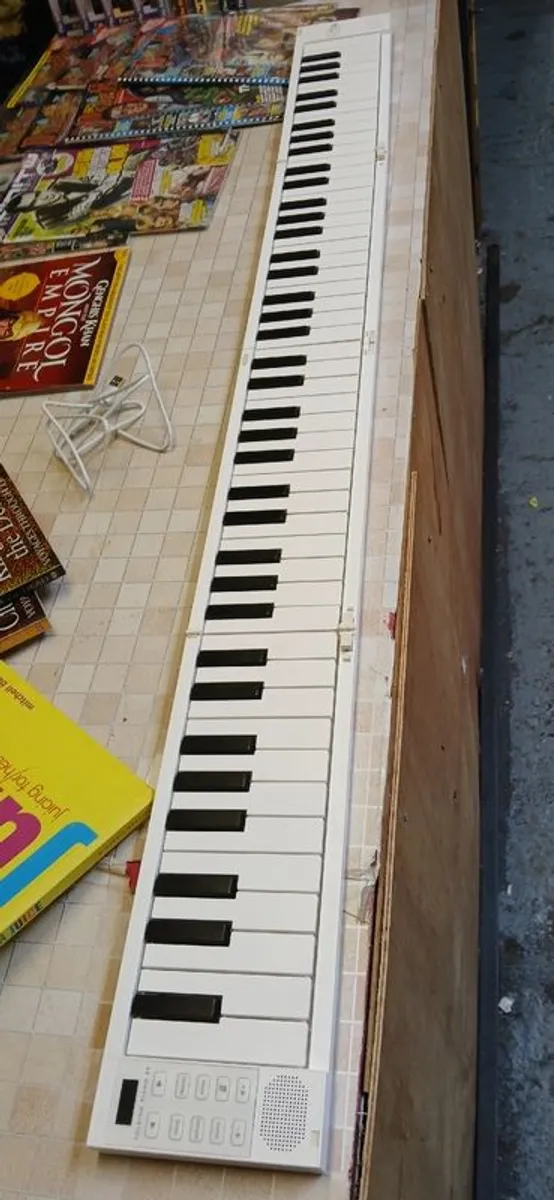 Folding Piano - Image 1