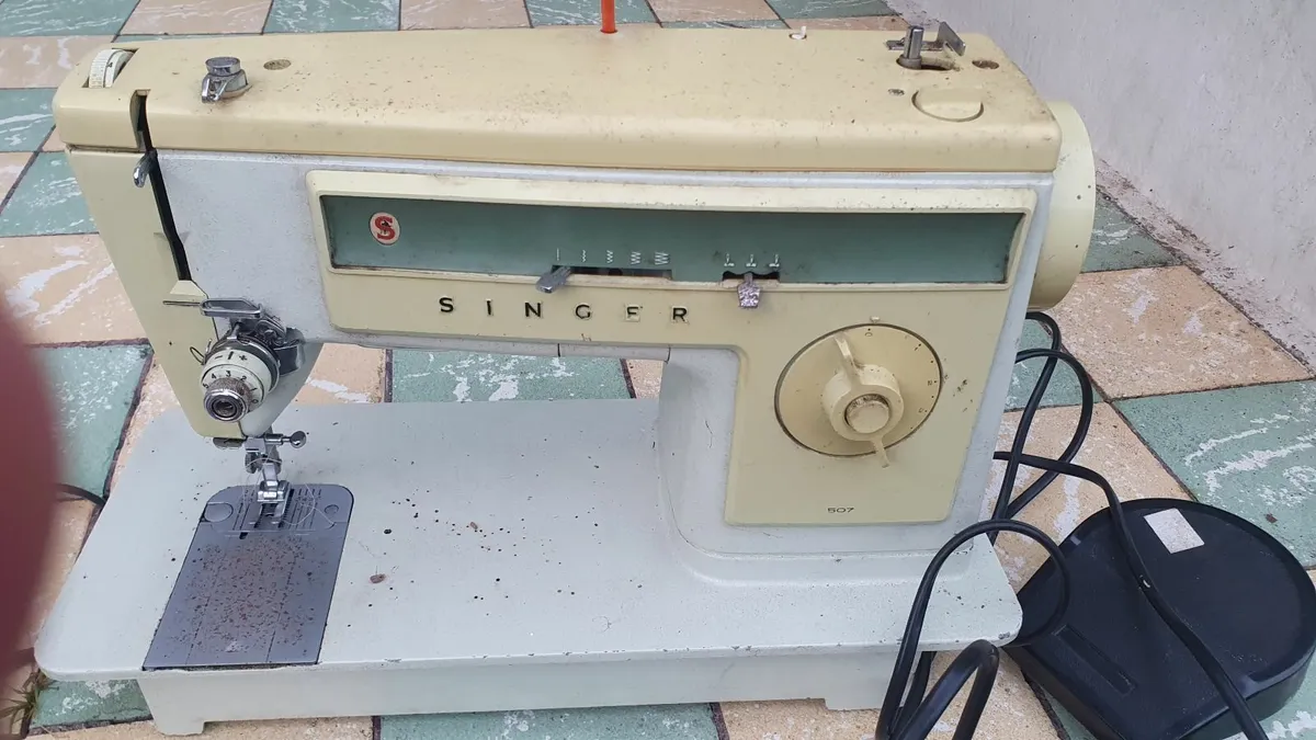 Vintage Singer Sewing Machine with Pedal - Image 1
