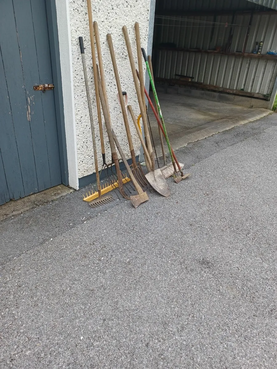 Selection of farm or yard tools - Image 1