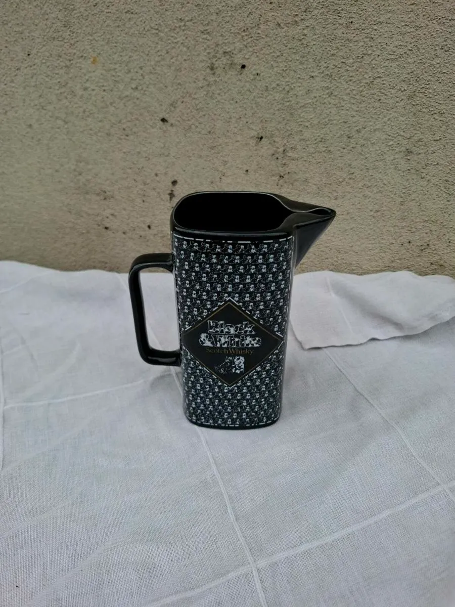 Black and white pitcher jug postage possible