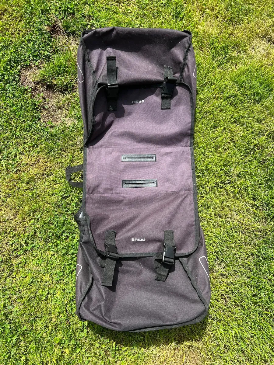 Bike locks, helmets, and saddle bag - Image 1