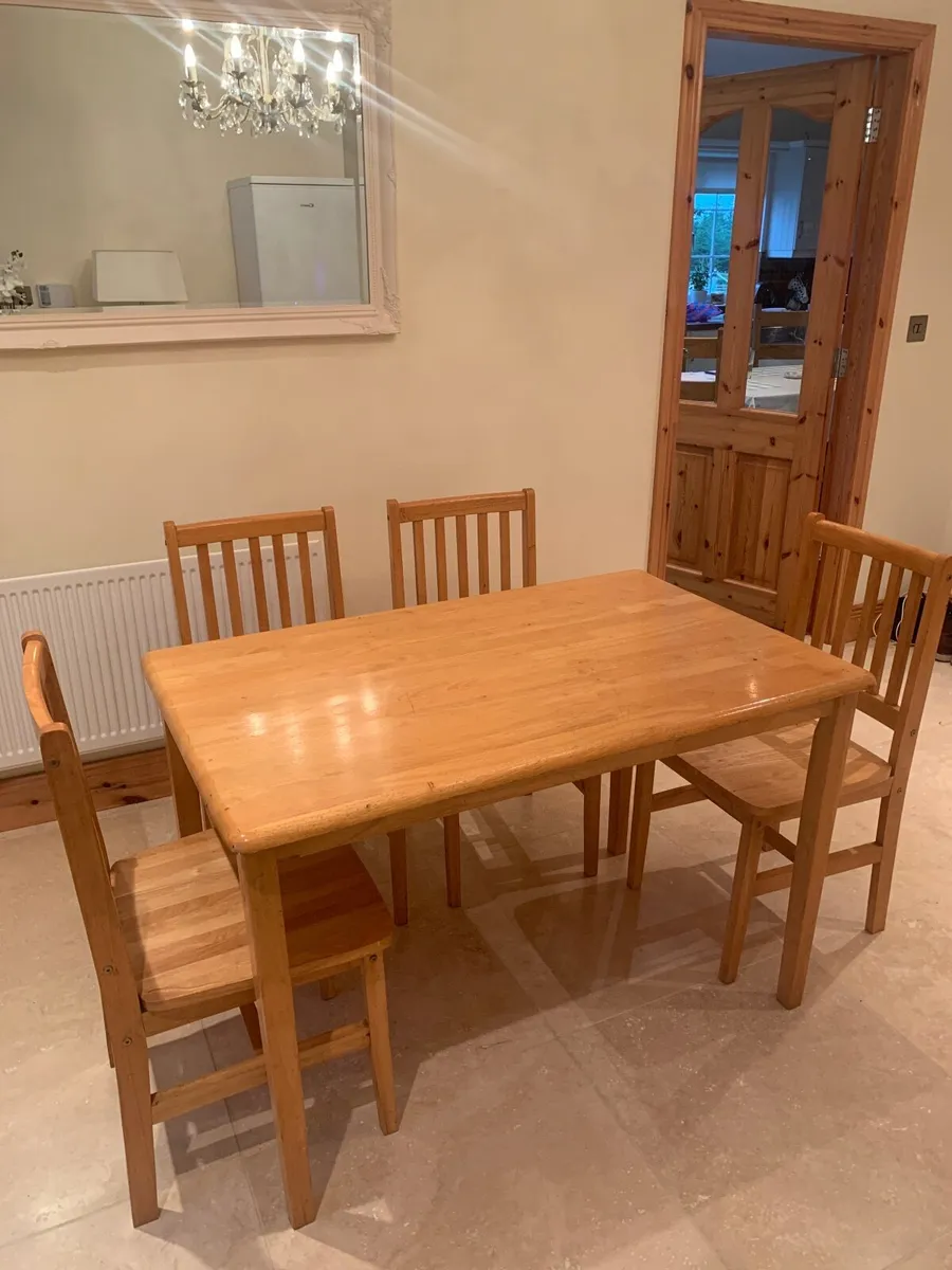 Solid pine table and 4 chairs great condition - Image 1