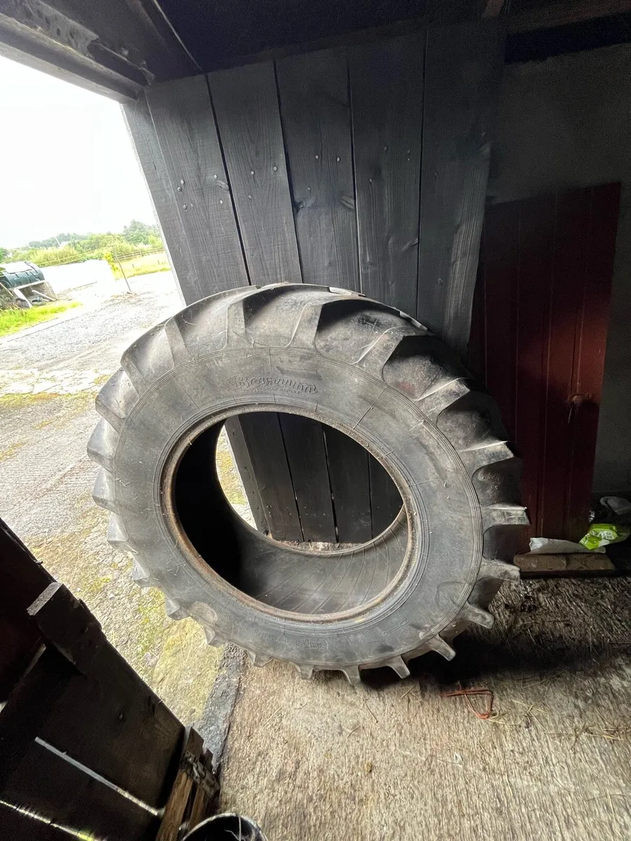 Tractor tires,vintage plow - Image 1