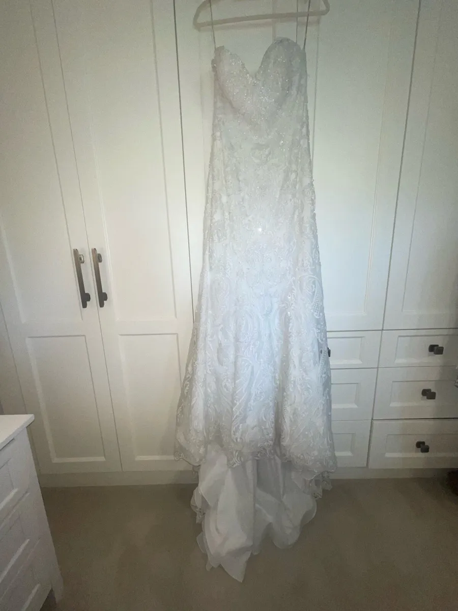 Wedding dress size 14 new - Image 1