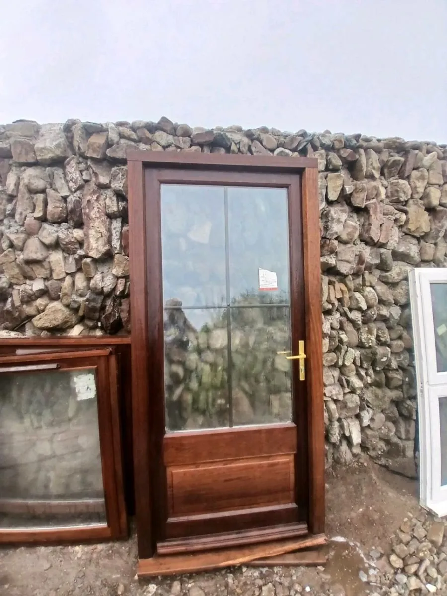 Unused hardwod Double glazed door and 2 windows - Image 1