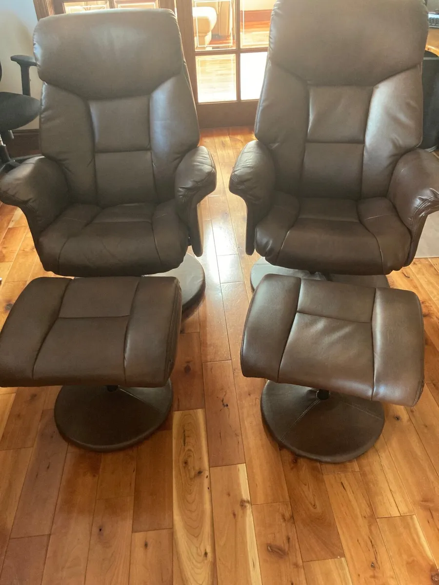 (2) Chester Reclining swivel leather chairs