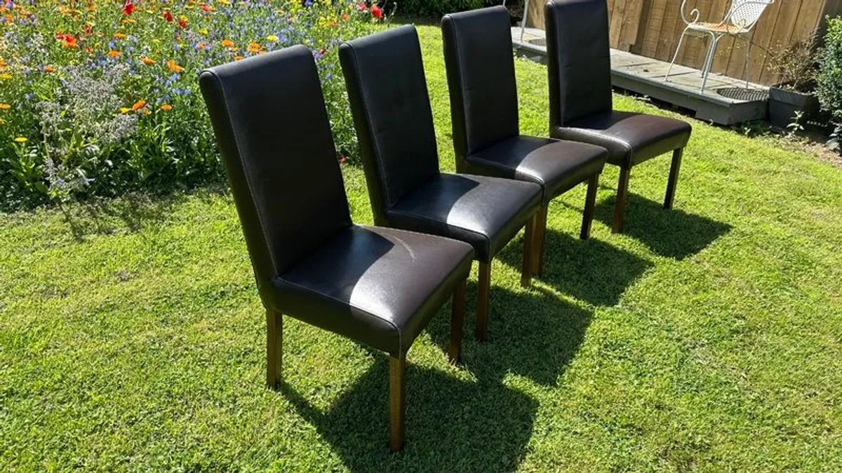 4 leather and wood dining chairs - Image 1