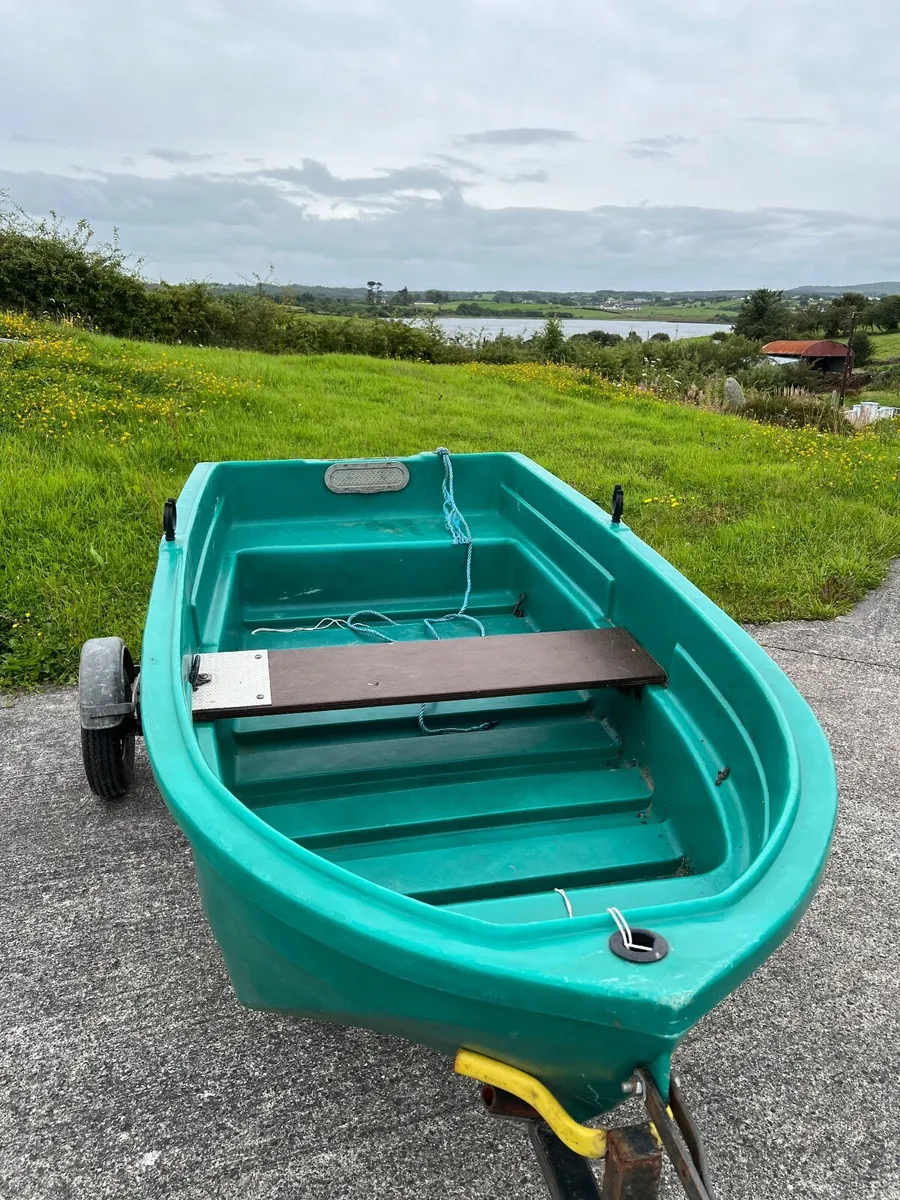 fishing boat ( Johnson seahorse 4HP 2 stroke Motor - Image 1