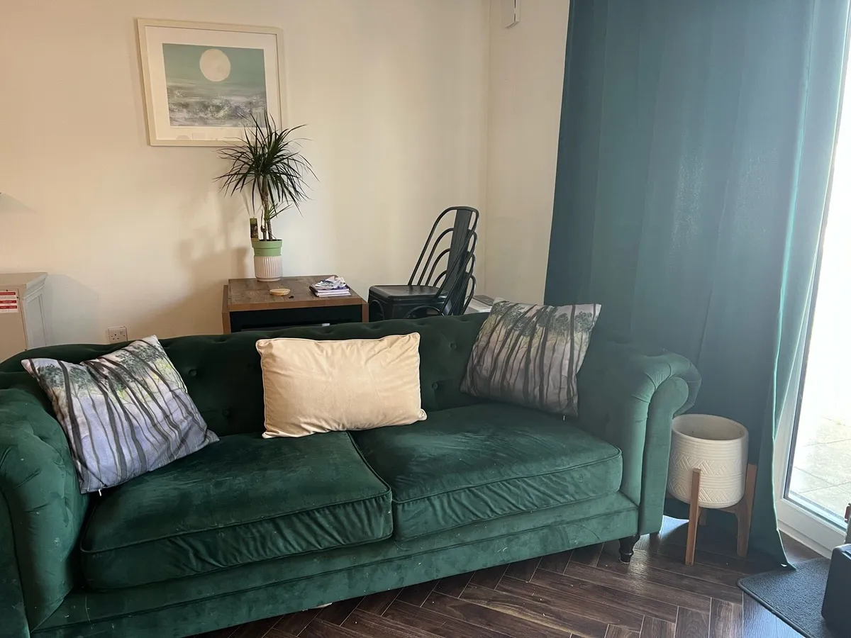Green chesterfield couch - Image 1
