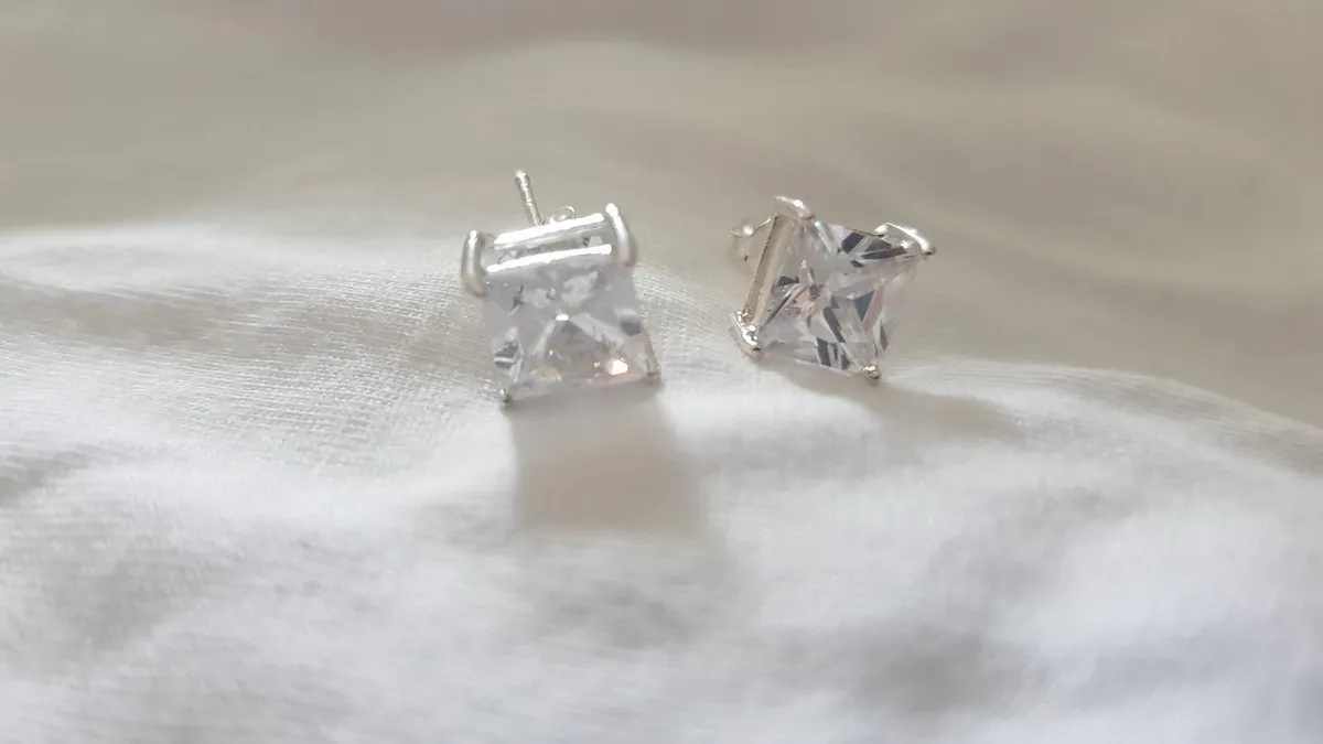 silver earrings - Image 1
