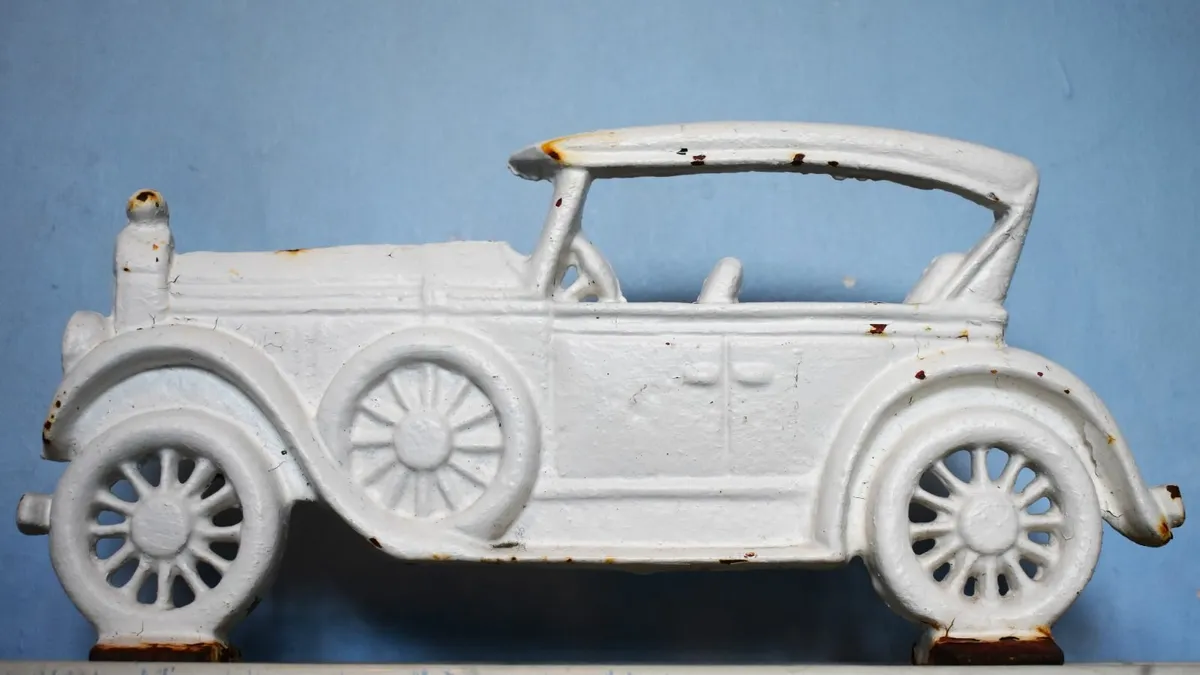 Antique Ford Car Cast Iron Door Stopper - Image 1