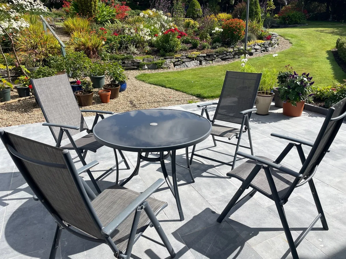 Patio table and 4 chairs - Image 1