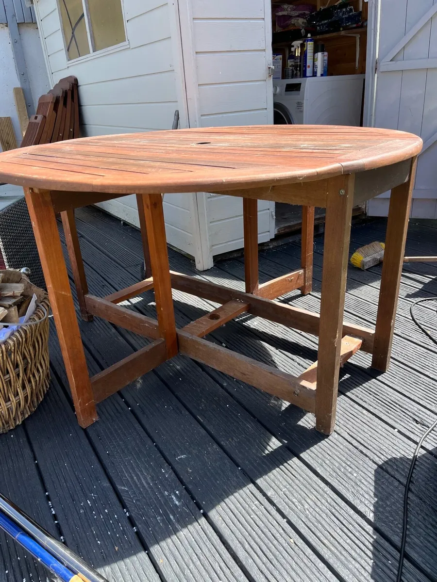 Outdoor wooden table and chairs - Image 4