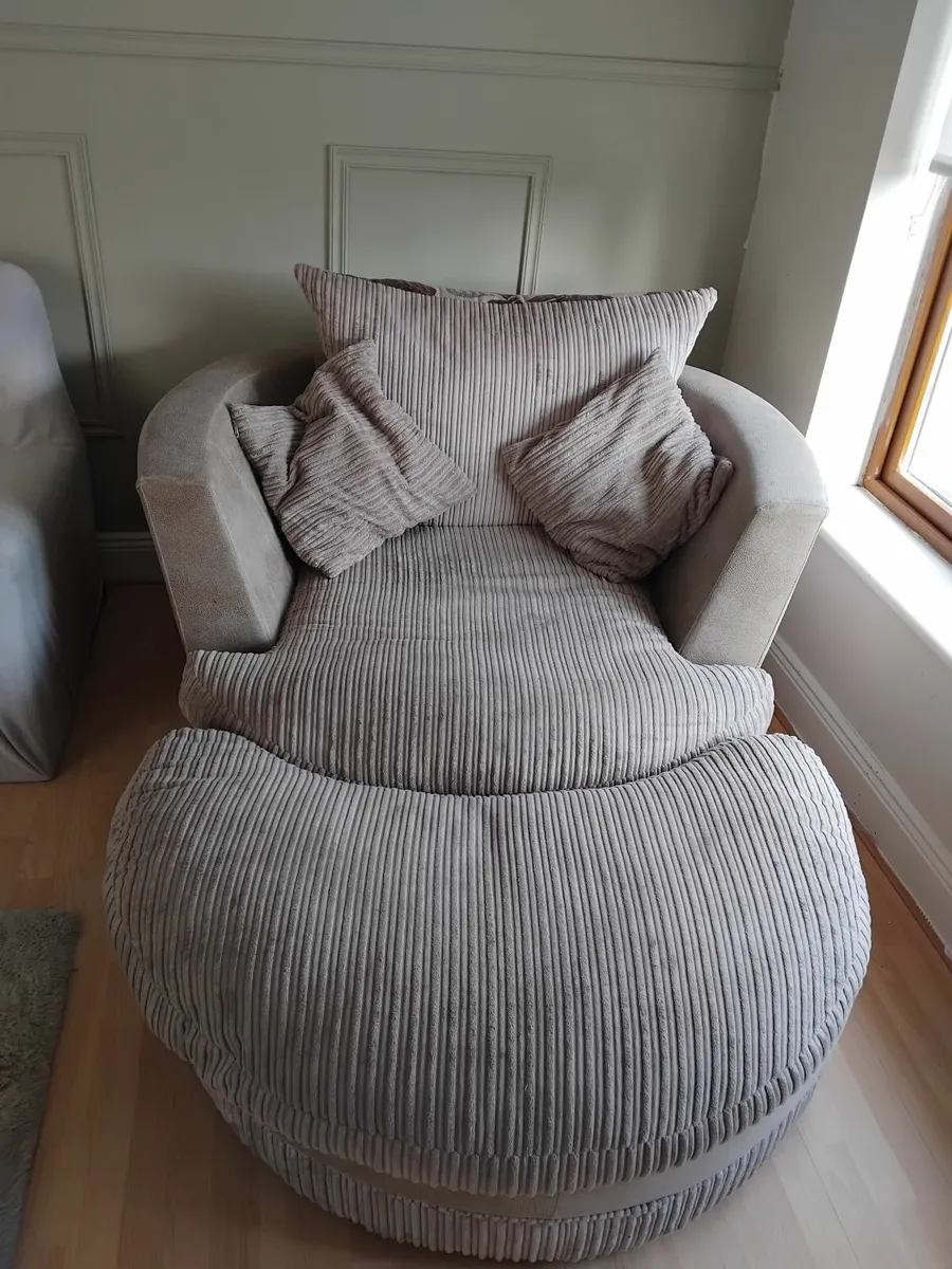 Swivel cuddler chair