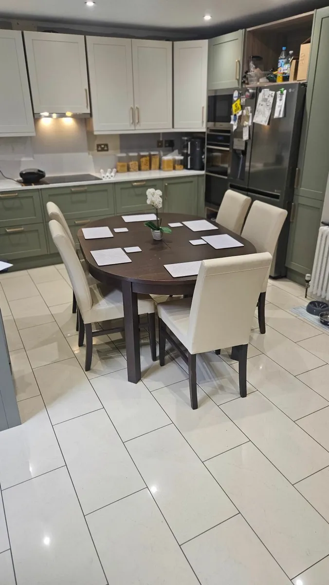 FreeExtending dinner table and chairs 75 each. - Image 1