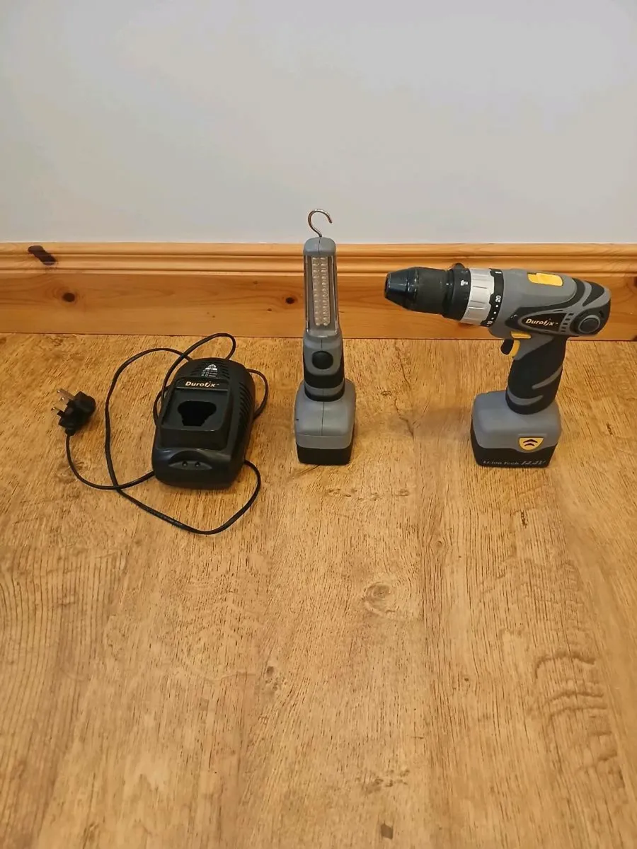 14.4 v drill and light - Image 1