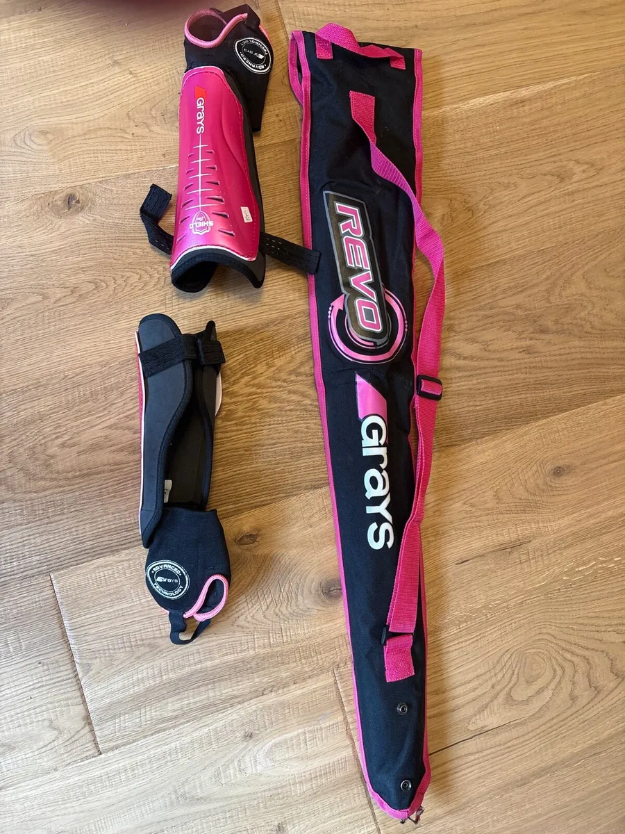 Hockey stick and shin guards - Image 1