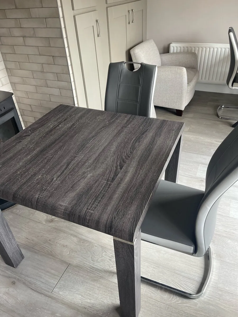 Dining table and four chairs - Image 1